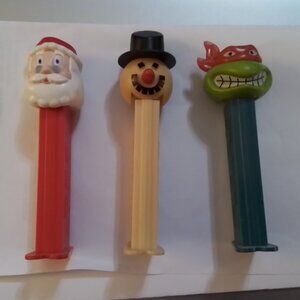 Pez dispensers, Santa, Snowman and Ninja turtle Rafael